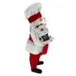 Figura de santa chef de 28 cm con batidor y casa de jengibre