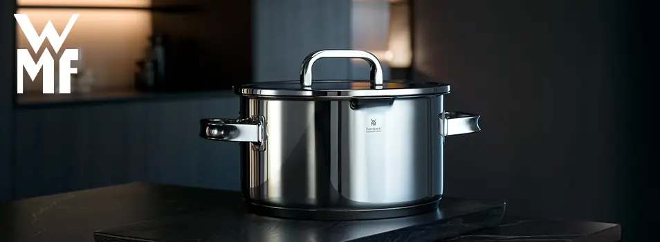 Olla de acero inoxidable Cromargan de la línea Function 4 de WMF sobre una superficie de piedra oscura