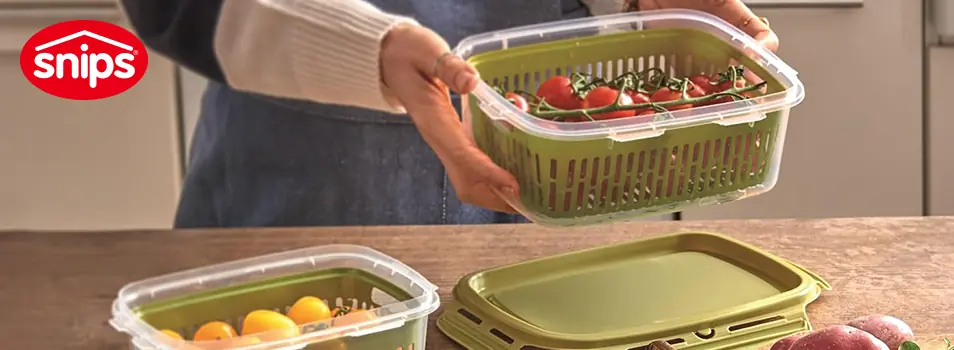 Contenedor SNIPS con colador integrado lleno de jitomates cherry